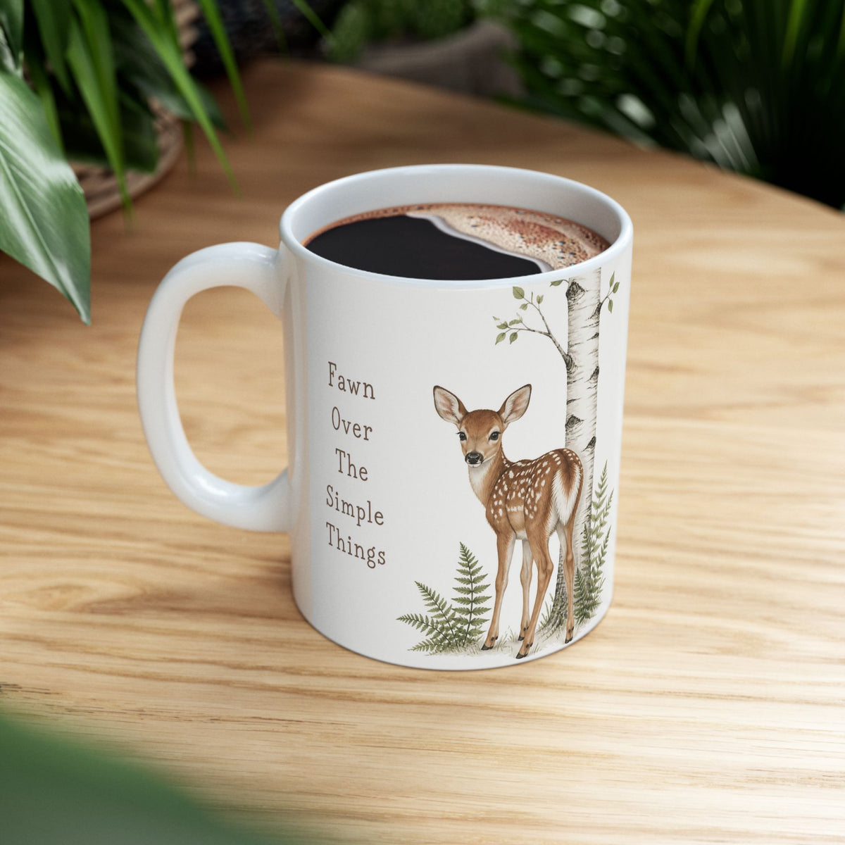 Ceramic deer mug shown from the side