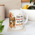 Fall coffee cup with orange and gold watercolor trees

