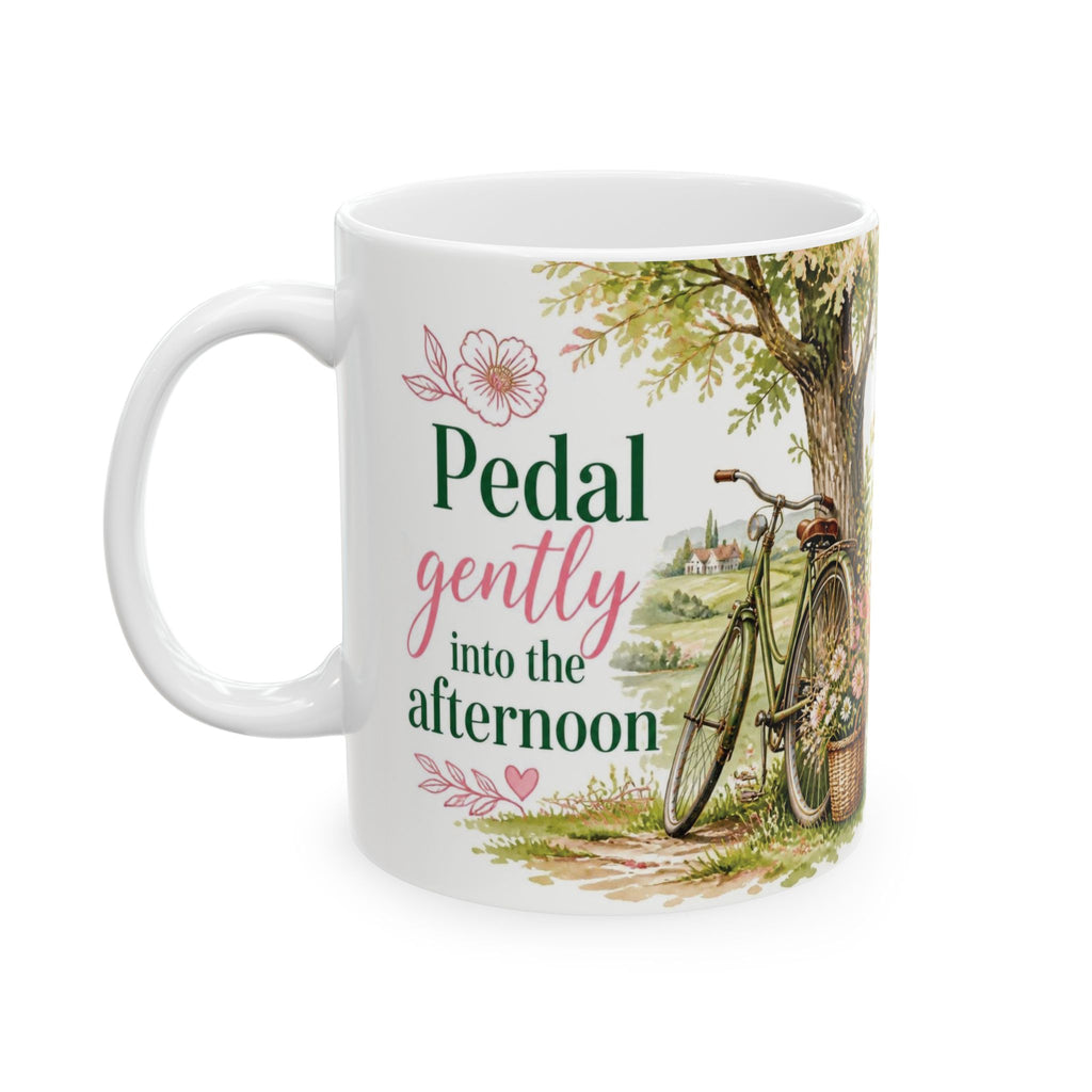 White ceramic tea cup with “Pedal gently into the afternoon” message
