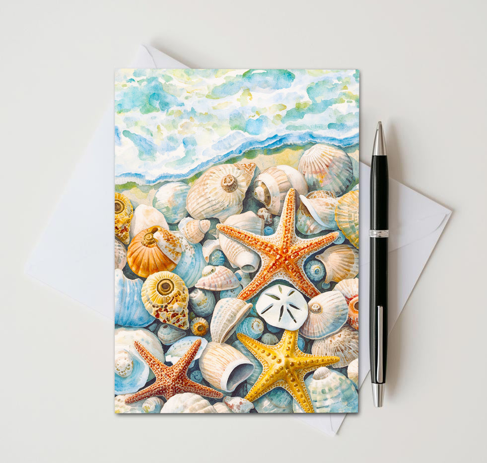 Greeting card with seashells and starfish design on a white background